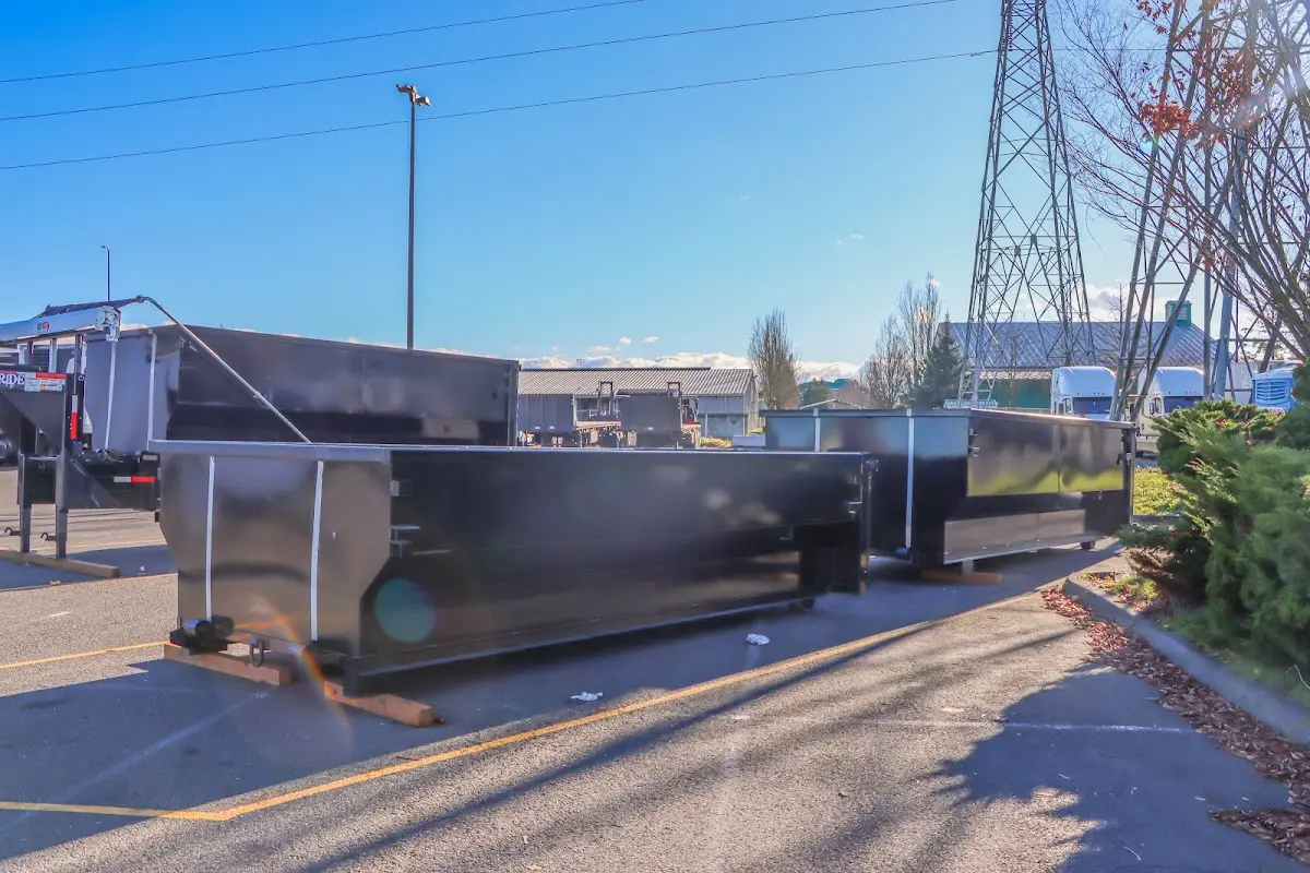 Roll-off dumpster ready for waste disposal at job site for 2 Yard Dumpster Rental in Winfield